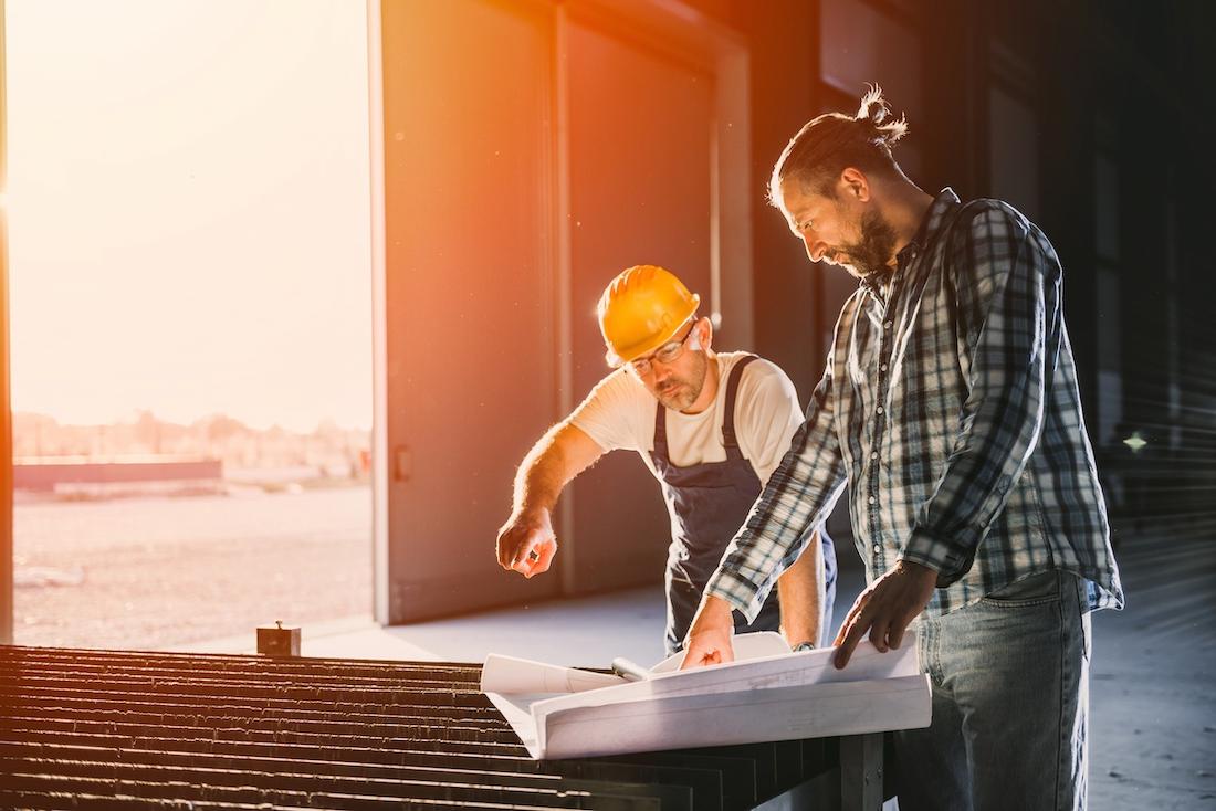 Two men creating a Quality Inspection Process